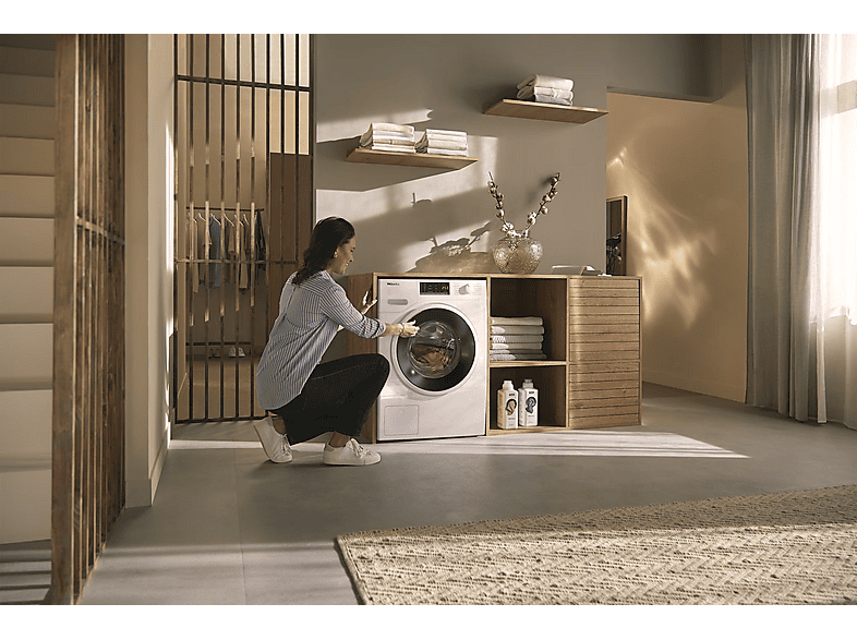 Lavadora carga frontal MIELE en color Blanco loto de 8 kg — foto 5